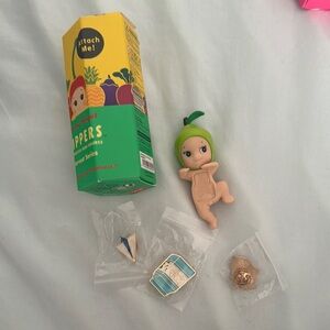 Green Kewpie Doll with Accessories